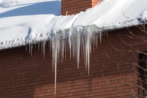 snow and ice on roof