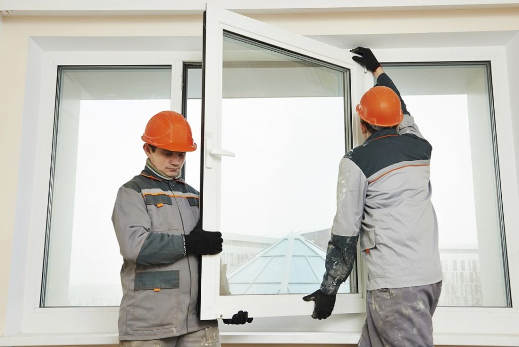 workers installing windows