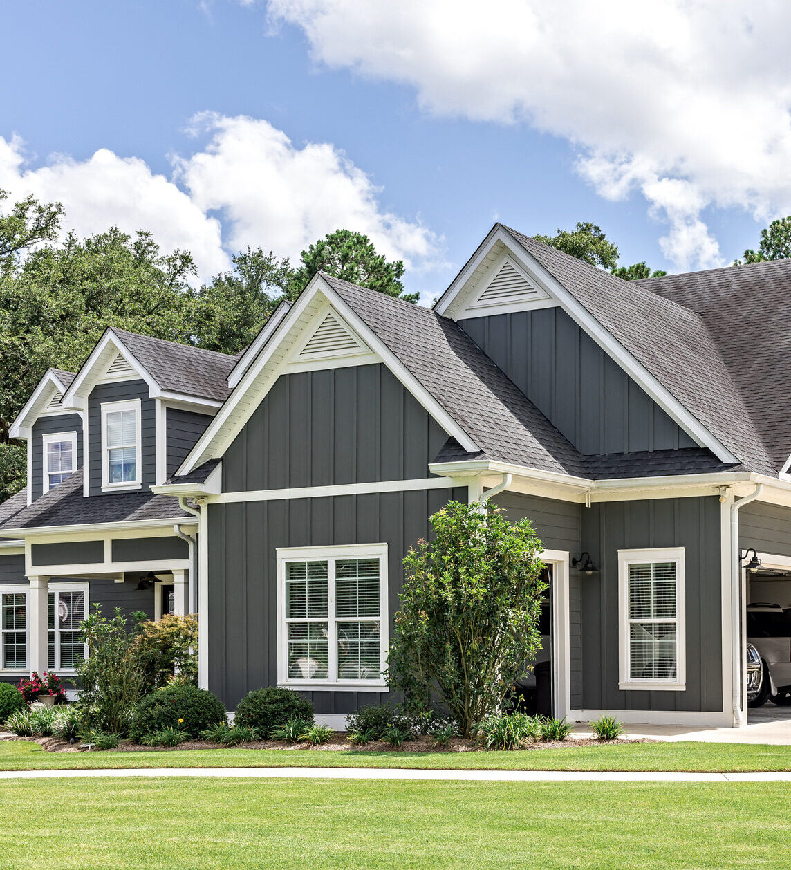 A large gray craftsman house